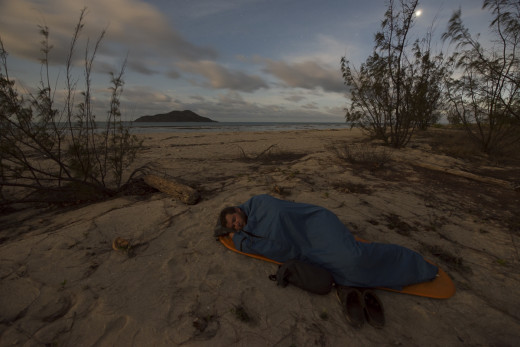 Keeping a low footprint while traveling alone is much easier.  Here, I am sleeping just above the beach on Getullai Island in the Torres Strait, Australia before photographing a tern colony the next morning.